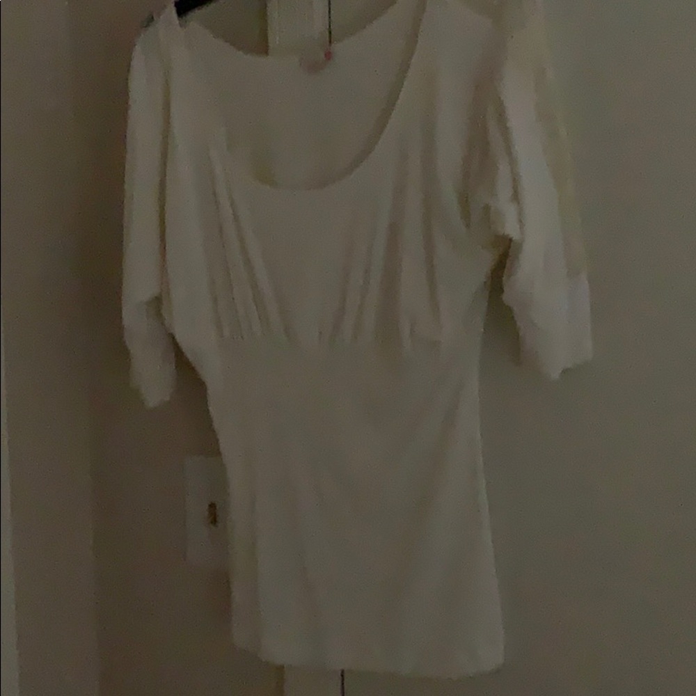 Beautiful top by Guess! Lace insert sleeves